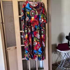 Maxi dress with beautiful color scheme. Never worn